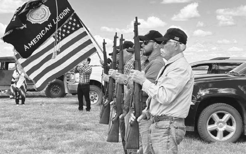 American Legion members from Timber Lake fired a salute over the grave of Jack Kraft at the Kraft Family Cemetery. Photo by Kathy Nelson