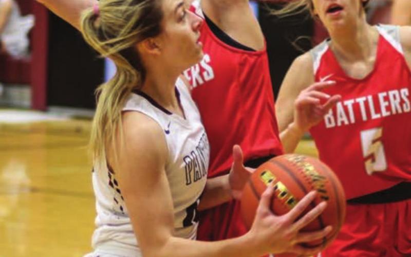 Shay Kraft powers through the Battler defense on her way to the hoop.