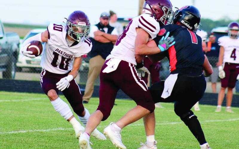 Timber Lake’s Gavin Farlee (10) follows the block of teammate Brody Ellison on a kickoff return last Friday night, Aug. 23, when the Panthers traveled to Ipswich to take on the Tigers in the South Dakota Class 9A football season opener for both clubs. Ipswich won the contest 42-0. Timber Lake hosts Philip at Doug Kraft Field this Thursday, Aug. 29, with kickoff slated for 6 p.m. Photo by Jon Flatland