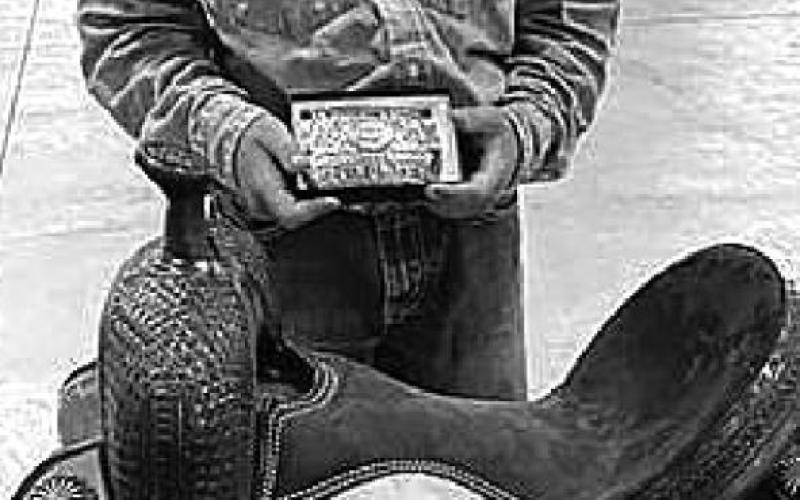 Pete Maher of McLaughlin/ Timber Lake won the State 4-H Championship saddle in junior boys goat tying.
