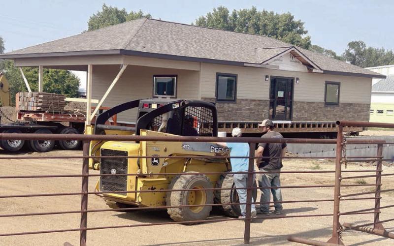 A new building for Western Dakota Bank’s Isabel branch rolled into town last week and was placed on its foundation. Built by Custom Touch Homes in Madison, the building is located on Highway 20 just south of the Isabel Community Center and includes a drive-through window. Western Dakota Bank is shooting for a November opening date in the new location. Photo by Jon Flatland