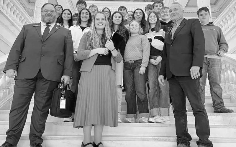 The Timber Lake High School senior class took part in Senior Day at the State Capitol in Pierre last week, touring the grounds and visiting several offices. The class is pictured with District 28 legislators (l-r) Rep. Travis Ismay, Rep. Jana Hunt, and Sen. Sam Marty. Chaperoning the students were Mr. Leuning and Mrs. Lemburg.