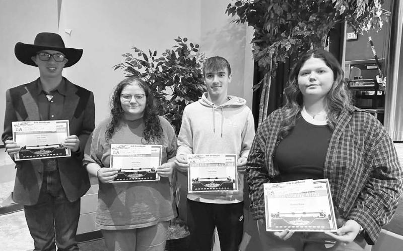 Karyl Boldt presented these special awards to her Timber Lake High School English students. L-R Kade Conner (The Student Has Become the Teacher Award); Molly Miller (Day Maker); Gavin Farlee, (Most Entertaining Argument); and Serenity Webb (Most Creative Writer).