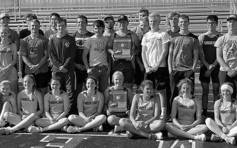The Timber Lake varsity boys and girls track teams posed with their two Region 8B championship trophies after a big day in Lemmon last week. Submitted photo