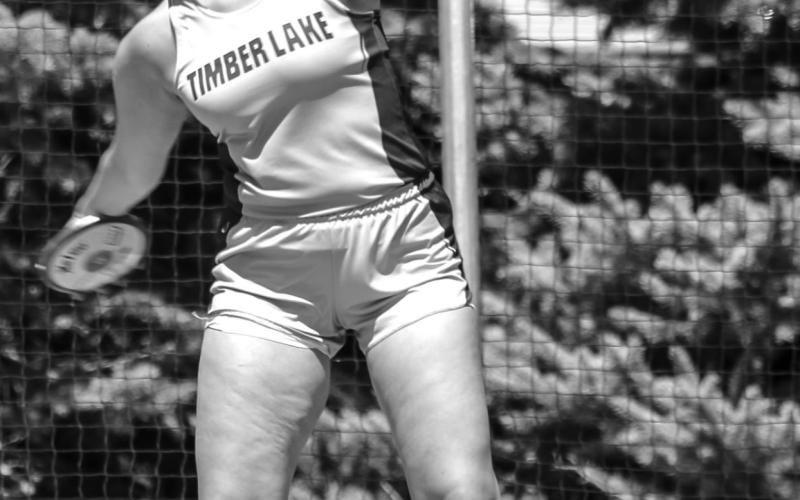 Timber Lake senior Tia LeBeau heaves the discus,