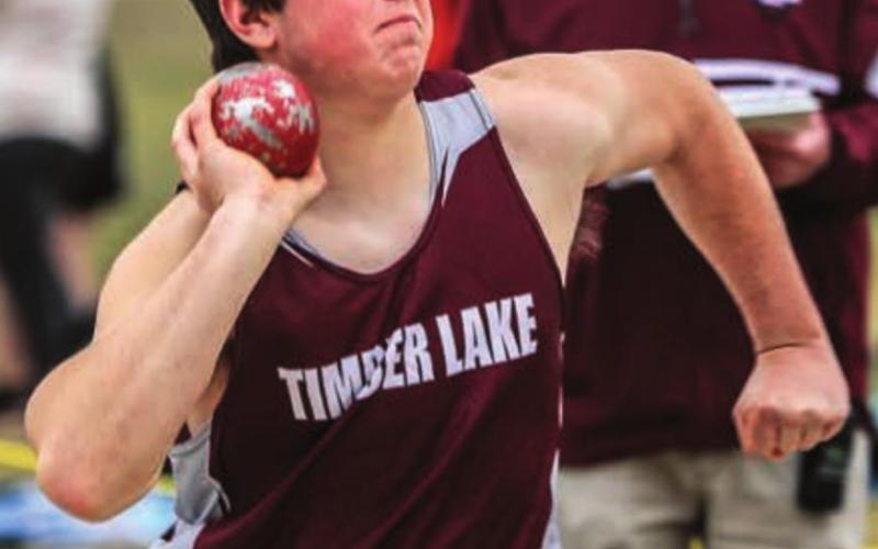 Konor Lindskov prepares to heave the shot put in a home Panther meet this season. The TL boys won the conference title. Photos by Robert Slocum