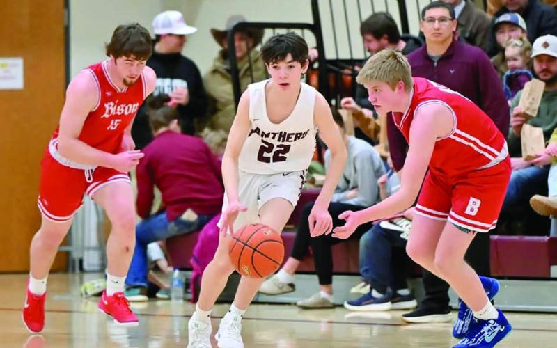Pistol Pete ... Timber Lake freshman guard Pete Maher (22) heads upcourt after stealing the ball from a Bison player during the Panthers’ 55-51 win over the Cardinals last week. Maher came off the bench to score 15 points in the matchup. Timber Lake, 12-6 overall, travel to Eagle Butte Thursday, Feb. 20, to take on the 13-4 Braves in a clash between Dewey County teams. The Panthers will wrap up their regular season schedule on Feb. 28 by hosting Potter County. Photo by Marie DuPreez