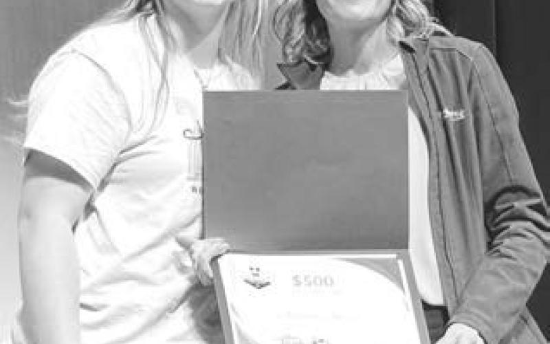 Jordan Jones (left) received a $500 Scholarship from Buche Foods and Team Buche Cares. Buche Foods owns stores in Gregory, Mission, Pine Ridge, Oacoma, Sisseton, Wagner and most recently Mobridge (formerly Payless Foods).