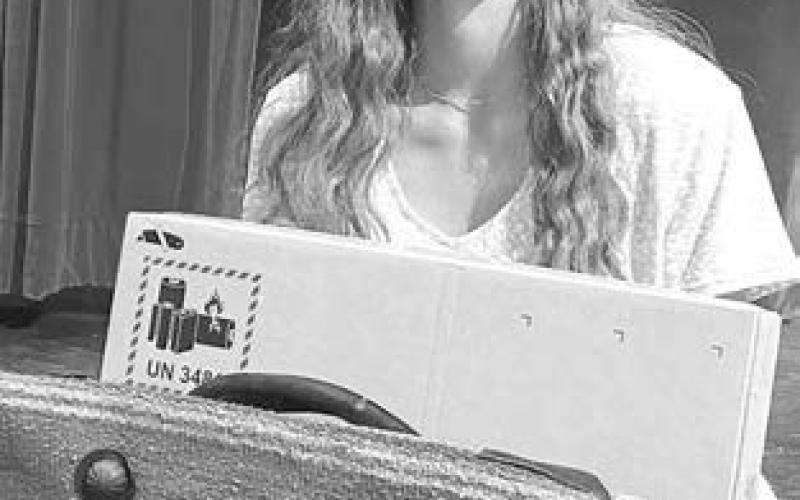 Natalie Lawrence was the winner of a computer from the American Indian College Fund. Her name was drawn at random from among the 17 seniors who participated in any of the Higher Pathways programming. They all received a binder and a bag from the AICF presented by Amy Sandquist, Native American Education Coordinator.