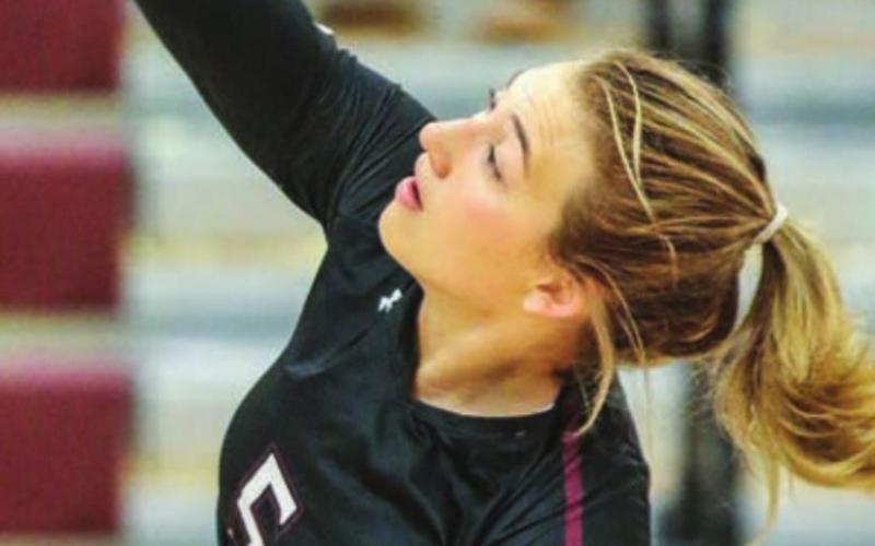 Timber Lake junior Shay Kraft slams a spike over the net in recent varsity volleyball action. Photos by Jon Flatland