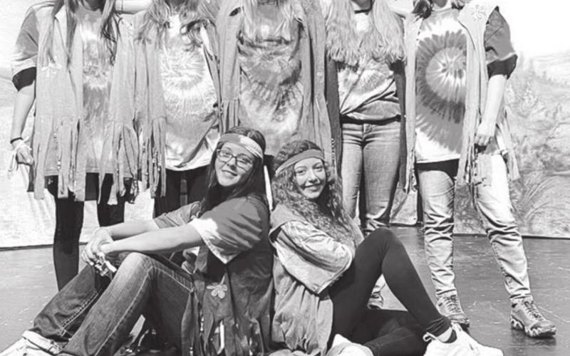 ABOVE: THE WILDFLOWERS FRONT (L-R): Presley Goldade, Arianna Bieber; BACK: Amanda Red Bear, Sara Keller, Geana Bollinger, Emma Johnston, Maria Scherer.