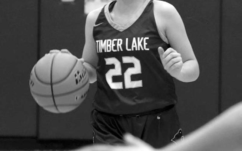 Freshman guard Ruby Maher brings the ball into the front-court for the Timber Lake Lady Panthers during action against Little Moreau Conference foe Lemmon last Friday, Dec. 8. Photo courtesy of Marie Du Preez