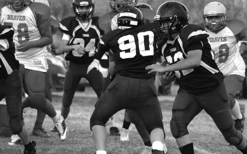 Kwinsey Russell taking the ball down the field for the Dupree JH Football team as they beat the CEB JH Braves 54 to 0.