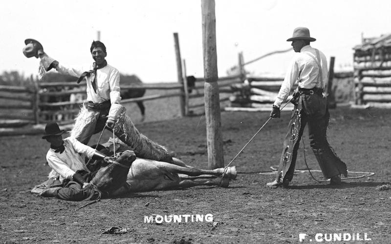 The posed antics of cowboys are a popular theme of many of Cundill’s photos.