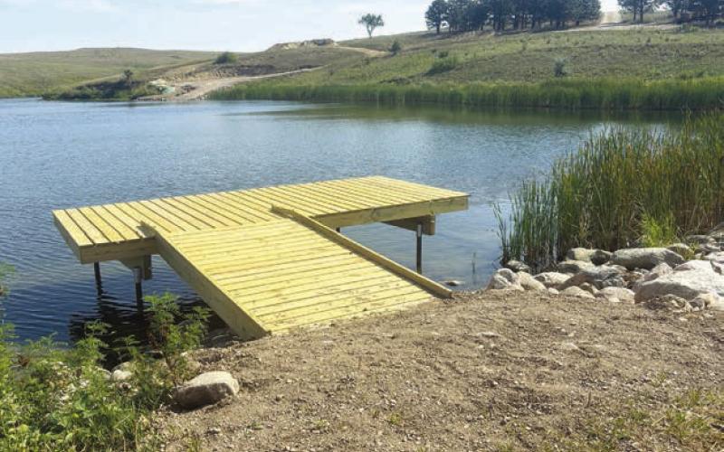 A small fishing dock was built on the face of the dam.