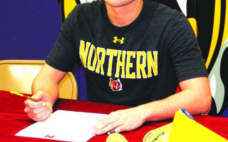 Dupree High School senior JW Pederson, son of Bret and Cindy Sue Pederson, has accepted a scholarship and officially signed with the Northern State University cross country and track teams. Pederson will start his college career at NSU in the fall of 2024, where he plans on studying to become a chiropractor. Photo by Patty Peacock