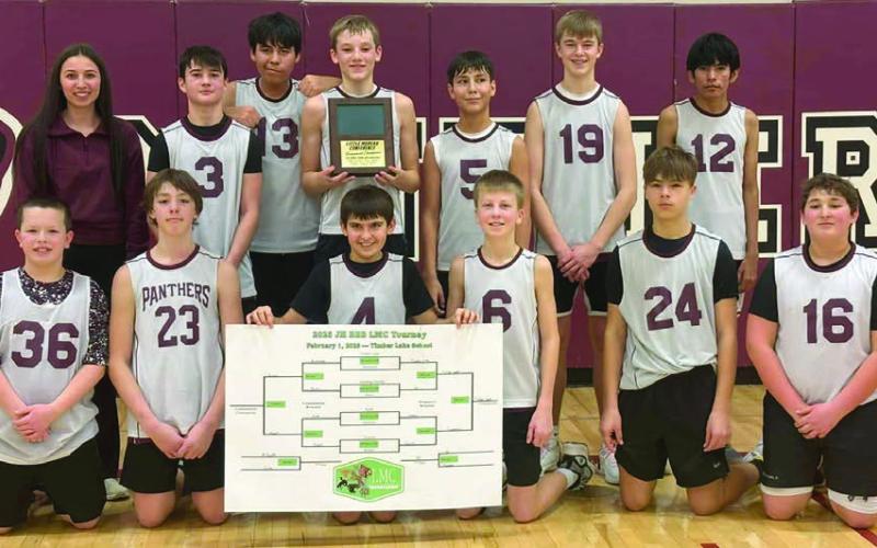 Timber Lake captured the championship at the Little Moreau Conference Jr. High boys basketball tournament played Saturday, Feb. 1, in Timber Lake. Team members include (back row, l-r) Coach Josie White, Blake Lei, Theo Taylor, Braxton Farlee, Camden Ley, Owen Schweitzer and Brayden Brown; (front row) Garrett Nilson Michael Bollinger, Koy Hunt, Gracen Gill, Zander Van der Merwe, and Baylor Bickel.