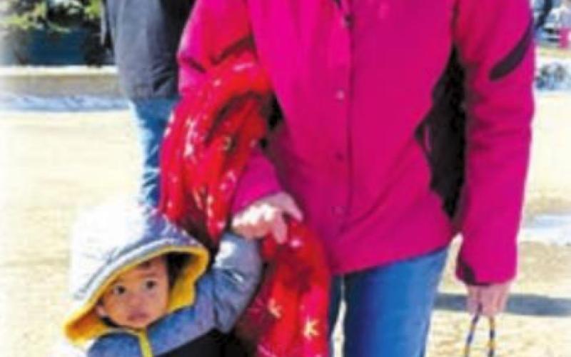 Cathy Booth and grandson Atlas Cunningham