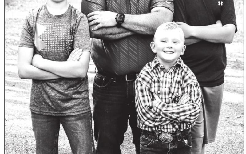 Joel Schweitzer with his sons (L-R) Owen, Isaac and Evan