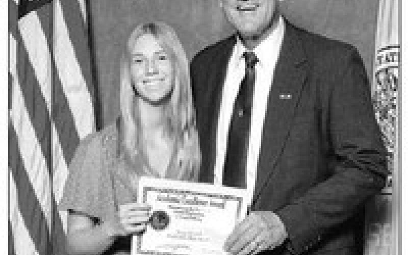 Averie Marshall of Timber Lake High School and Lt. Gov. Larry Rhoden