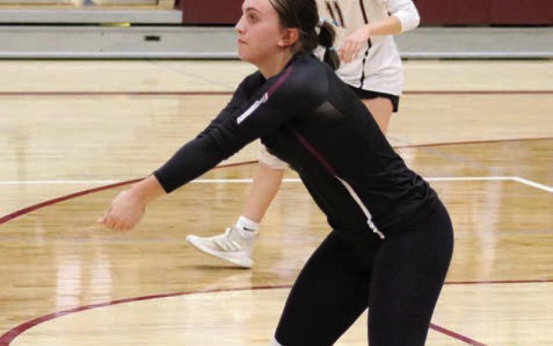 McKenzi Vomacka returns a shot for Timber Lake during the Panthers’ five-game match with visiting Wall last Tuesday.