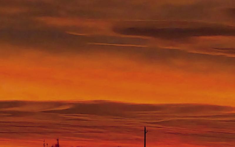 An orange sunrise sky over the region last week provided a breathtaking, vibrant display of color for those who were out of bed early enough to catch the morning spectacle to the east. The sunrise colors ushered in several days of mild winter weather after a week-long cold snap. Topic Photo/Jon Flatland