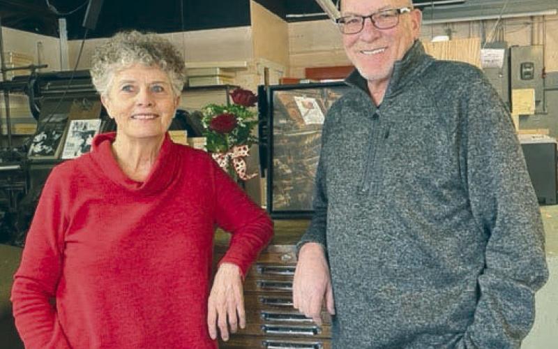 Longtime Topic publisher Kathy Nelson with new owner Jon Flatland. Nelson is semi-retiring after 42 years as publisher. Flatland has more than 30 years experience and has been with the Topic as staff writer and sales manager since fall of 2019.