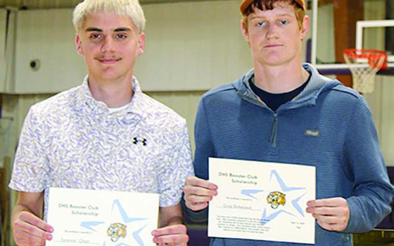 Receiving scholarships from the Dupree High School Booster Club were (l-r) Spencer Olsen and Cruz Birkeland. Photo by Patty Peacock