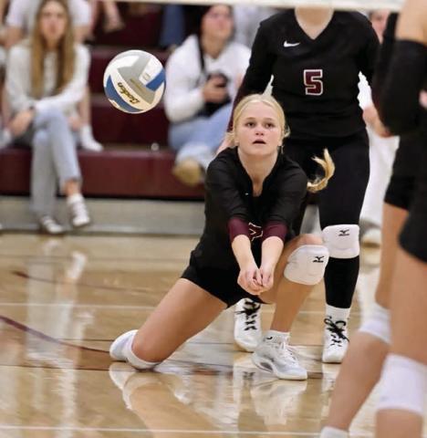 Senior Sara Keller, left, goes up for a spike attempt during Timber Lake’s matchup with McLaughlin last Tuesday, Sept. 23, in Timber Lake. Above, senior Hailey Roggow goes for a bump during the action. The Lady Panthers swept the Mustangs in three games to snap a 10-match losing streak.