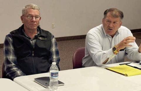 Sen. Mike Rounds (R-SD), right, speaks at a meeting last Monday, Sept. 22, in Pierre. At left is Doug Simons, president of the South Dakota Wheat Growers Association. Photo by Bart Pfankuch