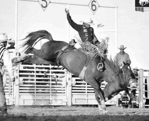 Shorty Garrett of Dupree shows his form while competing in the saddle bronc riding event at a recent rodeo. Garrett is the current leader in the PRCA’s Badlands Circuit standings and is ranked 25th overall in the world. Photo courtesy of Chuck Miner
