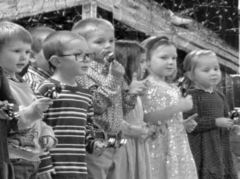 The Holy Cross Kids for Jesus (K4J), under the direction of Cheryl Lawrence and Sarah Schweitzer, presented a Christmas program at St. Joseph Center on December 14. AT RIGHT: Kasmer Lamb, Rowan Bridges, Douglas Kraft, Mayzee Martin, Jessa Aberle, Drew Long.