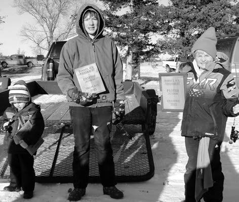 Youth Panfish Division: (l-r) Jaxon Hollenbeck, third; Michel Bollinger, second; Jameson Hollenbeck, first.