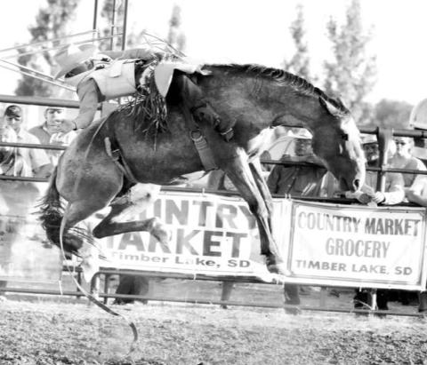 Clay Gerhardt of Mandan, ND was among the competitors in the ranch bronc riding event during the Saturday night performance of the Timber Lake Days of 1910 rodeo. Photo by Jon Flatland