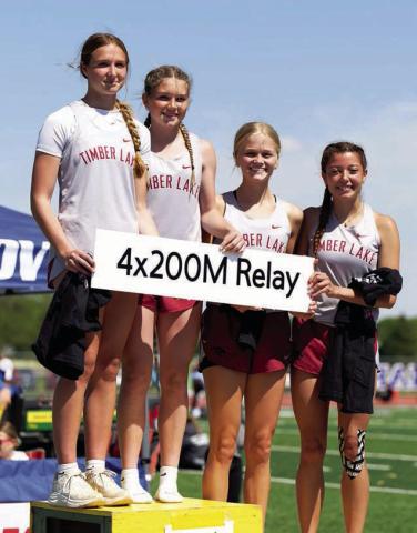 Setting new school records and qualifying for the State Class B Track Meet this week in Brookings is the Timber Lake girls 800 meter relay squad consisting of Josie Boldt, Korbi Heck, Hailey Roggow and Arianna Bieber. The group set a new school mark with a time of 1:50.04 this season. Photo by Marie DuPreez