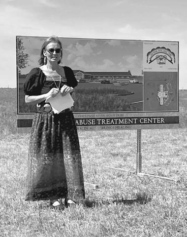 Acting Tribal Health Director for the Cheyenne River Sioux Tribe Molly Longbrake explains the time and effort that went into developing plans for a new substance abuse treatment center in Eagle Butte. CRST officials recently broke ground for the new facility. Photo by Warren LeBeau