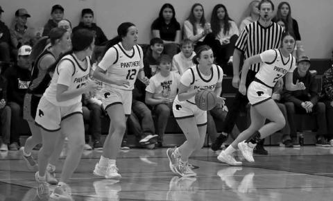 The Timber Lake Lady Panthers push the ball upcourt on a fast-break during girls basketball action against Ipswich on Saturday, Jan. 4. Left to right are Jaylee Schoelerman, Kessa Bigger, McKenzi Vomacka and Jasmine Nash. Photo by Marie DuPreez