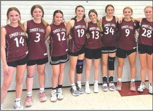Members of the Timber Lake Grade 7-8 girls basketball team earned second place at a tournament in Faith on Saturday, Nov. 11. Team members include, L-R, Ella Handeland, Addison Lindskov, Jalee Booth, Katie Martin, Korbi Heck, Lexi Locken, Maddy Hermes and Evelyn Gill.The team is coached by Jennifer Schoelerman, not pictured. Submitted Photo