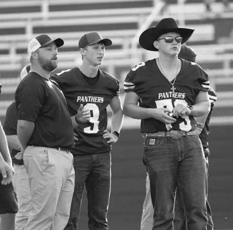 Braylen Hansen (73) watches the Panthers in action from the bench, where he has gone from player to coach. Photo by Marie DuPreez