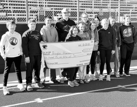 Top fundraisers for the Timber Lake Middle School Cancer Walk, pictured with Breylan Hansen, are Front (l-r): Karter Lindskov, Nathaniel O’Bryan, Emmett O’Leary, Remi Wiedmer, River Mowrer, Lily Handeland, Alexa Roggow; Back: Bricelyn Pederson, Pazlin Ducheneaux, Jiel Mowrer, and Cheyienna Nygaard.
