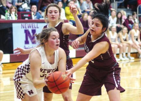 Timber Lake’s Cassie Carter (RIGHT) and Shay Kraft execute the Panthers’ full court press against Newell’s Sydnee Kjellsen in their Region 8B contest last week in Newell. Photo by Jon Flatland