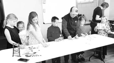 CC science competition where students built bridges and catapults. L-R: Rebecca Hunt, Kimber Clark, Elizabeth Hunt, Jackson Hunt, Caleb Simon, Olive Anderson, and Hannah Hunt.