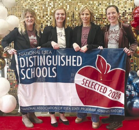 Accepting the National ESEA Distinguished School Award on behalf of the Timber Lake Elementary School at a ceremony in Austin, TX, last week were (l-r) Elementary Principal Danae Paxton, fifth grade teacher Kaitlyn Mendoza, Kindergarten teacher Theresa Keller, and Reading Specialist Alision Nilson.