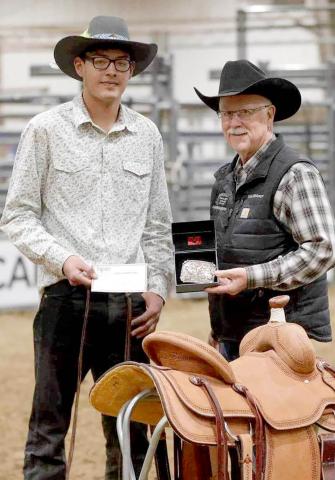 Chazz Gabe of Timber Lake , left, captured the NRCA Finals Rodeo bull riding championship over the weekend in Gillette, WY, to go along with the year-end title. Several competitors from Dewey County and the surrounding area garnered finals or year-end championships. Courtesy photo