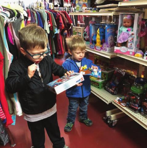 Lincoln and Trevor Aberle and their mom, Melissa, were at Dakota Silk Screen on Monday scouting out the Christmas merchandise. The boys were giving Mom some hints about what to put on their wish lists. They also visited the museum, where they saw lots of dinosaur bones and the T-Rex skull that their great-grandpa Bill Alley discovered.