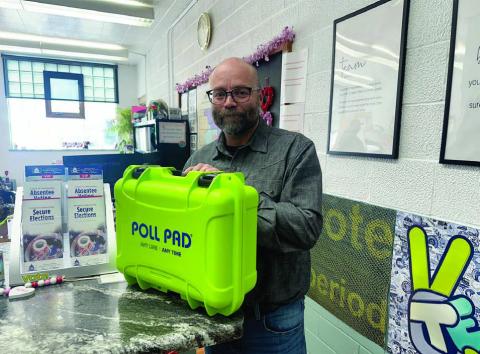 Dustin Van Balen of KNOWiNK shows off the new Poll Pad system that will replace the traditional paper poll book at Dewey County voting precincts starting with the June 2 Primary. The Dewey County Board of Commissioners voted 4-1 last week to implement the system.