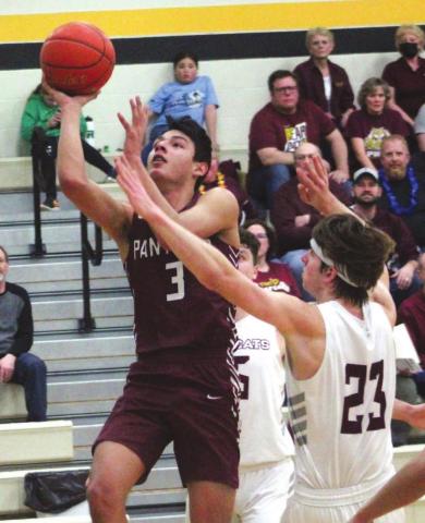 Timber Lake senior Chazz Gabe goes up for a shot against Freeman Academy/Marion’s Thalen Schroeder on March 8 at James Valley Christian. Photo by Ryan Deal/605 Sports