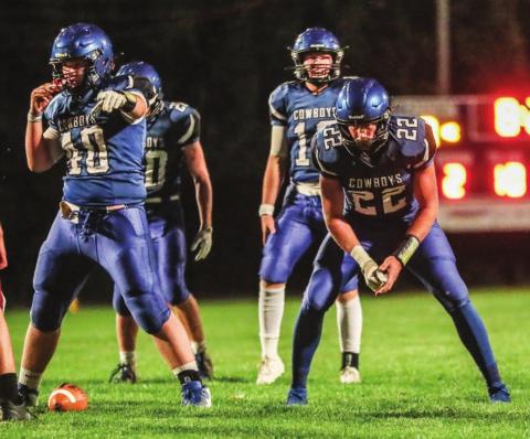 Lemmon/McIntosh gridders Carson Bailey (40), Matthew Mollman (20), Cody Thompson (12) and Tell Mollman (22) prepare for an offensive play during recent 9-man football action. Photo by Robert Slocum