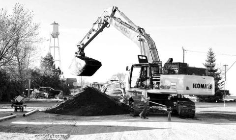 Crow River Construction has resumed work on the Timber Lake City Water Project. Above, the construction crew digs to install new lines on E Street. Photo by Kathy Nelson
