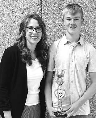 Colette Schaffer (teacher) presented the studio award to Owen Schweitzer.